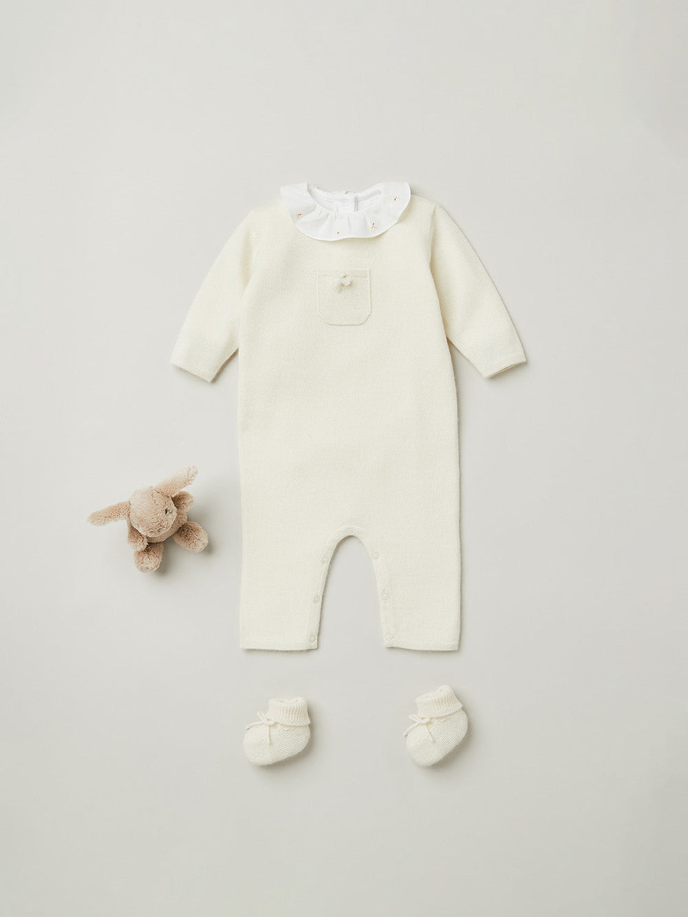 Baby cashmere sleepsuit in milk-white