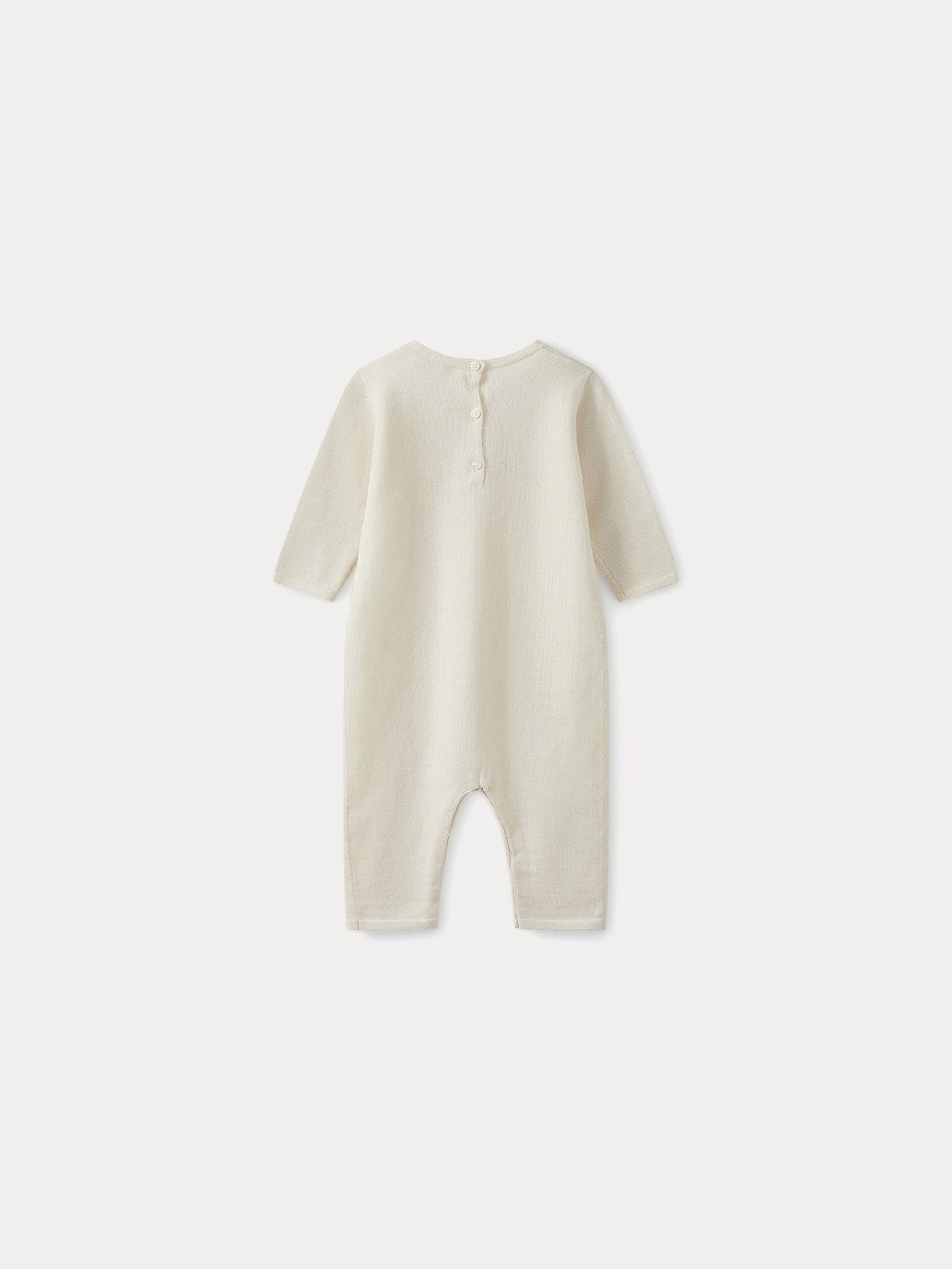 Baby cashmere sleepsuit in milk-white