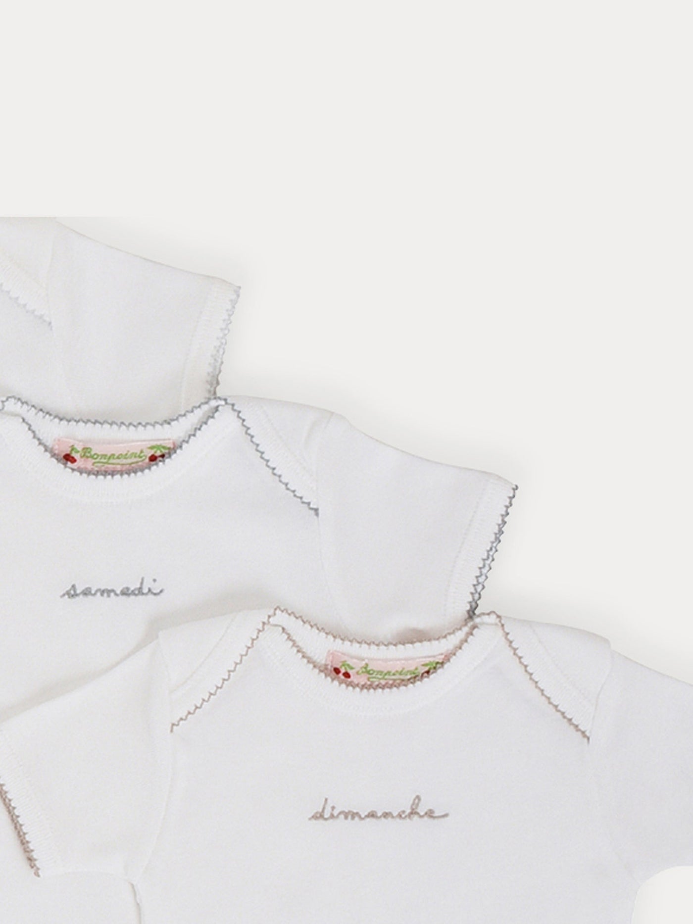 Baby Day-of-the-Week Onesies white