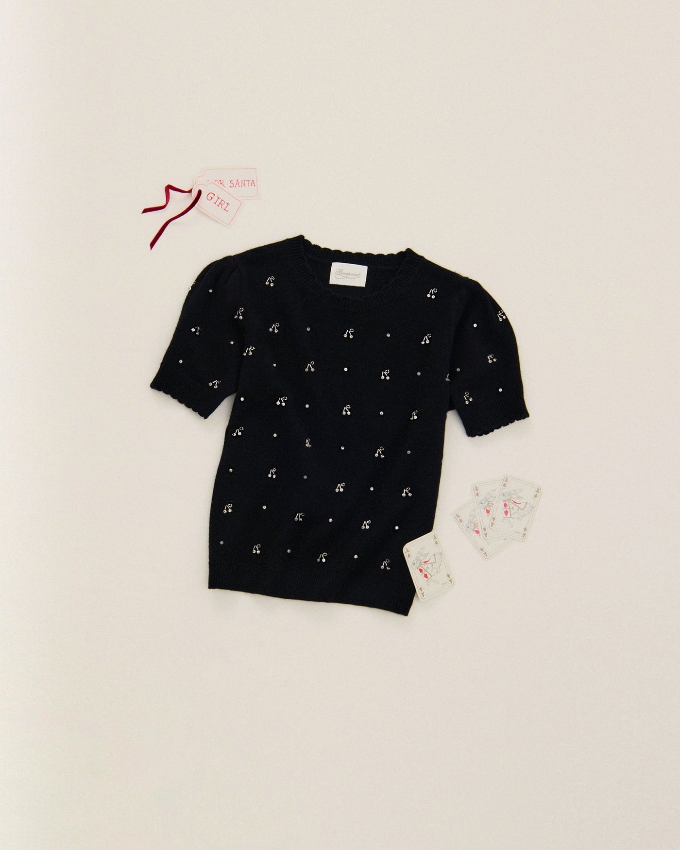 刺繍入りカシミヤセーター<br>445 €