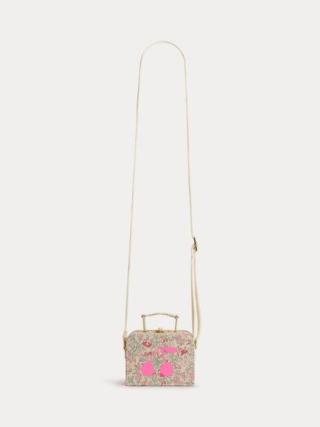 Aimane raspberry-colored suitcase bag in Liberty fabric with a