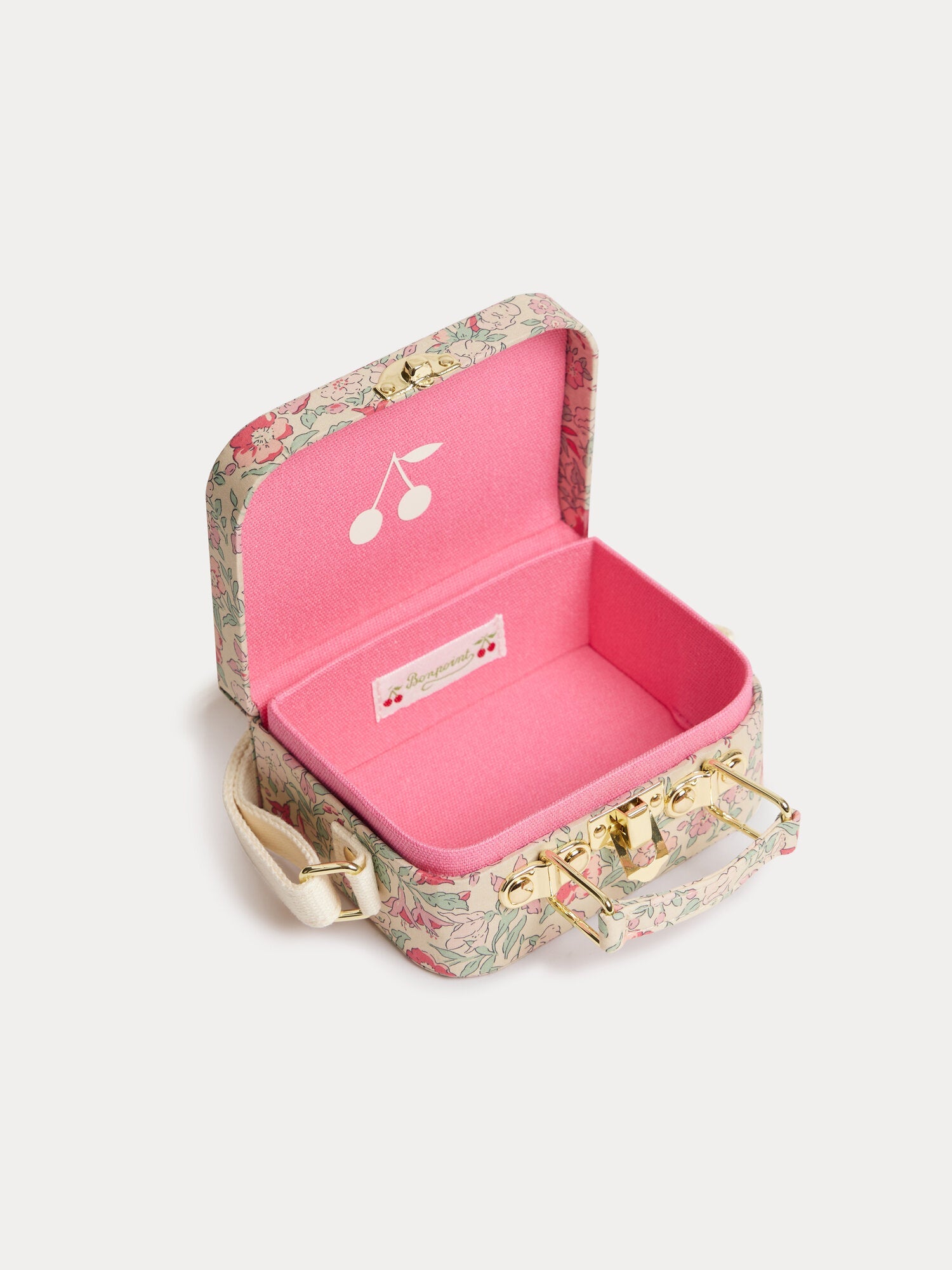 Aimane raspberry-colored suitcase bag in Liberty fabric with a