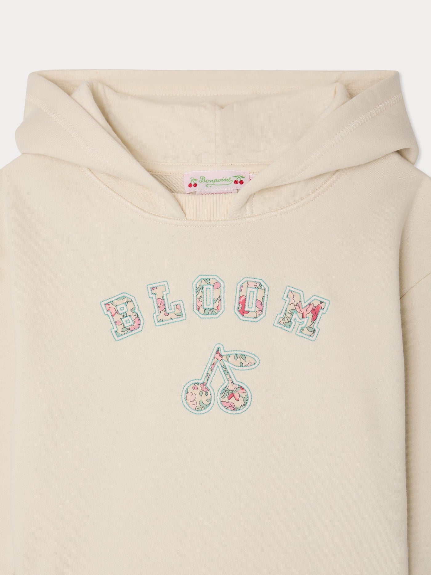Carmine sweatshirt appliqué in Liberty fabric in organic cotton
