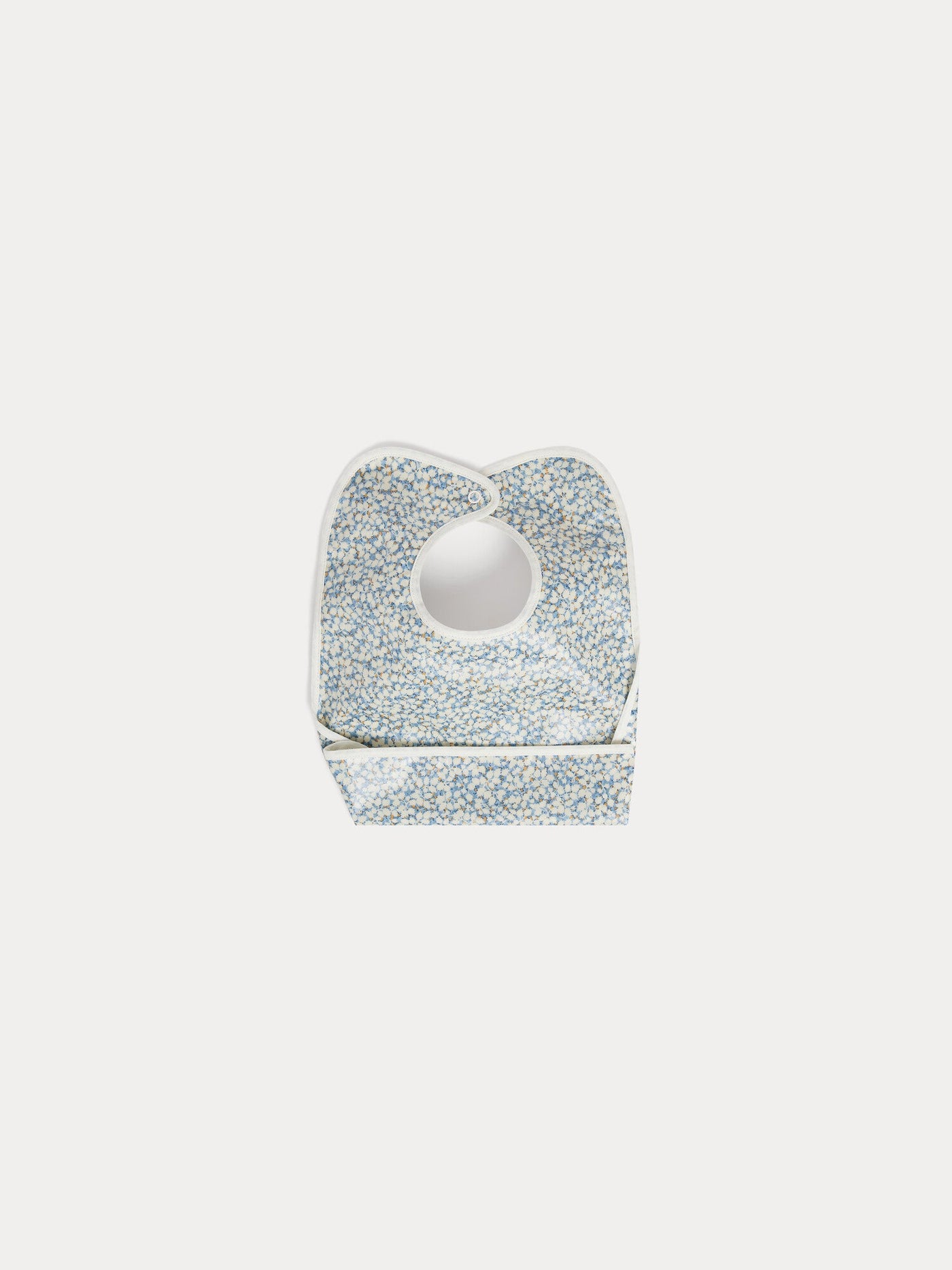 Clip-on bib in blue Liberty fabric in coated organic cotton