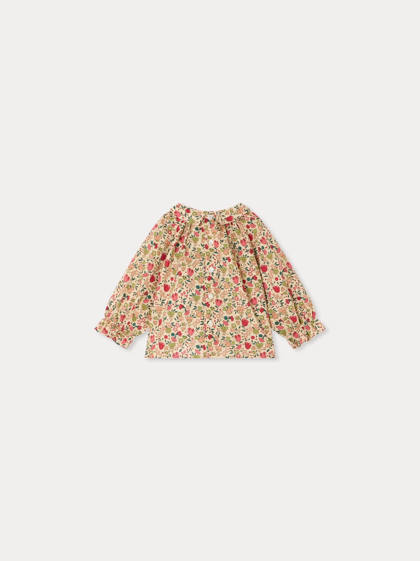 Pompom baby blouse in Liberty fabric smocked and hand-embroidered organic cotton